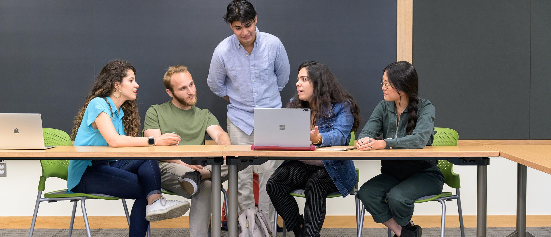 HDS students in small groups around the newly renovated campus